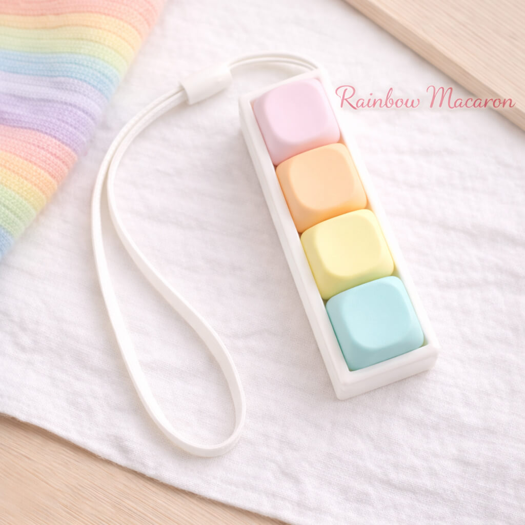 Toytiti Classic 4-Key MOA keyboard fidget clicker in Rainbow Macaron colors